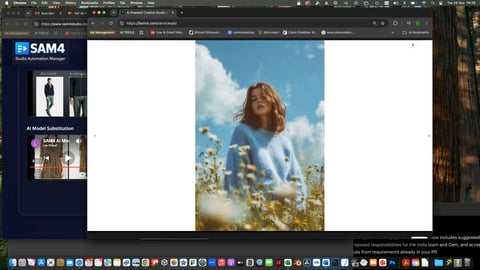 Woman with wavy blonde hair in light blue shirt standing in sunny field of white flowers against blue sky